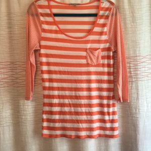 Orange and white striped baseball t